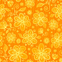 Fototapeta na wymiar Orange doodle flowers ornate seamless pattern