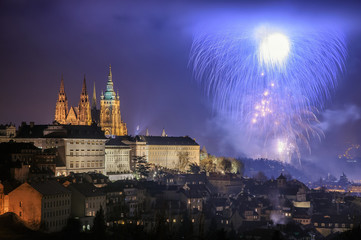 Fototapeta na wymiar Prague fireworks during New Year Celebration near St. Vitus Cathedral, Prague, Czech republic