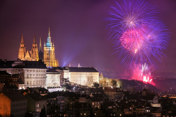 Fototapeta na wymiar Prague fireworks during New Year Celebration near St. Vitus Cathedral, Prague, Czech republic