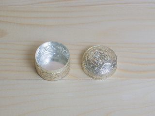 aluminum case on wooden background