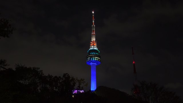 Lighting N Seoul Tower from the Namsan park at night.