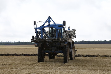Fototapeta premium Vehicle at Fields