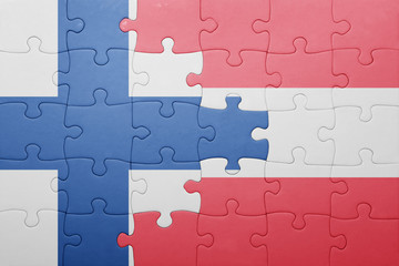 Fototapeta premium puzzle with the national flag of finland and austria