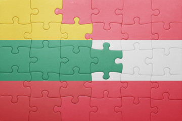 Fototapeta premium puzzle with the national flag of lithuania and austria