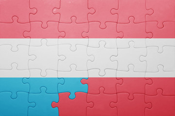 puzzle with the national flag of luxembourg and austria