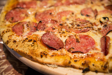 Thin peperoni pizza closeup