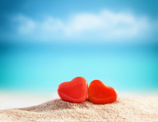 Two hearts on the summer beach