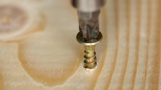 Use screw machine for insert screw into the wood

