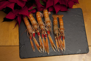 Langoustines for Lunch. Six cooked langoustines sit ready to be served for lunch. They are...