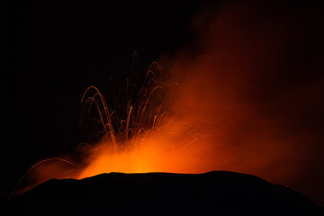 Volcano eruption. Mount Etna erupting from the crater Voragine
