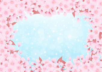 Obraz premium 桜の枠 水色キラキラ背景