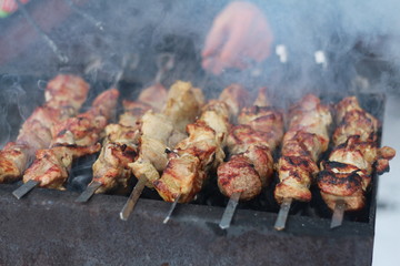 Cook meat on cinder and smoke