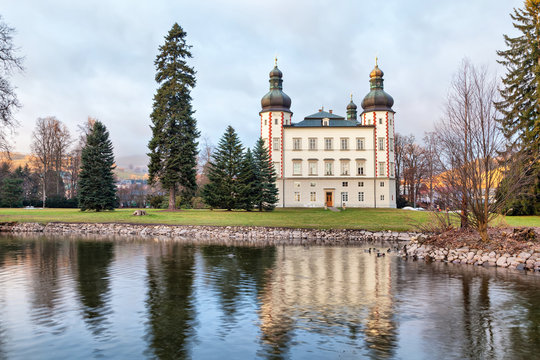 Vrchlabi castle reflecting in pond
