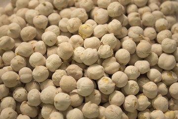 This is a closeup photograph of white roasted chickpeas