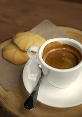 hot espresso and butter cookie in vintage tone
