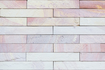 Modern stone brick wall background.