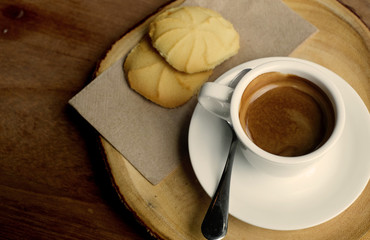 hot espresso and butter cookie in vintage tone