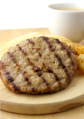 breakfast meal, pork burger, pancake,  hashbrown and coffee