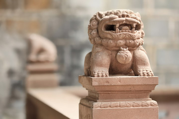 Guardian lion at an ancient Chinese residence