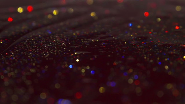 Sparkly Colorful Glitter With Oil Texture Background In Slow Motion
