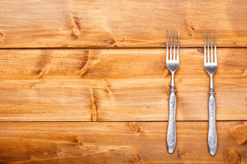 The forks on the wooden table