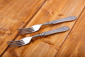 The forks on the wooden table