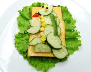 creative vegetable sandwich with cheese and sausage
