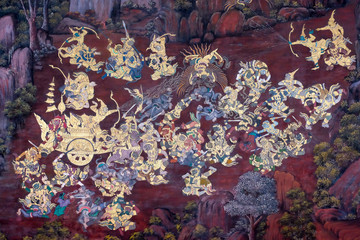 the Ramayana painting on the wall in public temple Wat Phra Kaew in Thailand