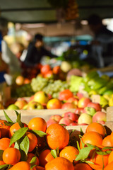 Closeup picture of fresh oranges fruits and vegitables at market