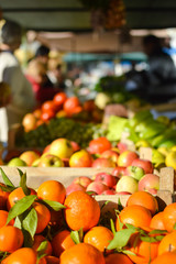 Closeup picture of fresh oranges fruits and vegitables at market