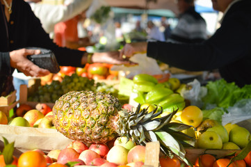 Sale, shopping, consumerism and pineapple in grocery market