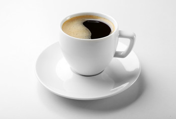 A cup of tasty coffee, isolated on white