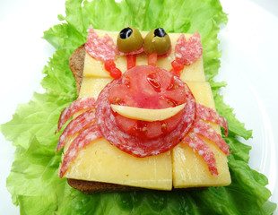 creative vegetable sandwich with cheese and sausage