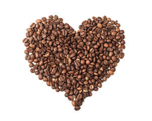 Heart shaped pile of coffee beans isolated on white