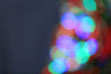 Christmas lights on Christmas tree of abstract background