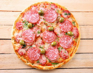 Delicious tasty pizza on table