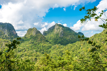 Beautiful green mountains hills and cloudy blue sky
