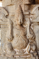 Carving of man inside an ancient Hindu temple in Hampi, Karnataka, India 