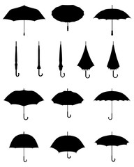 Black silhouettes of open and closed umbrellas, vector © SilhouetteDesigner