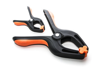 Obraz premium Plastic clamps used for clamping items isolated on white background