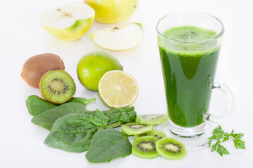 Healthy Green smoothie, spinach, kiwi, apple and lime, white background