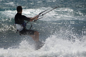 Kite surfer rides