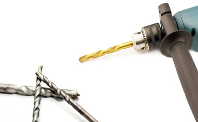 Electric drill with a chuck and  drills