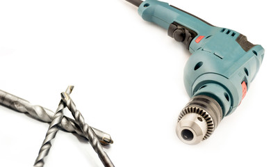 Electric drill with a chuck and  drills