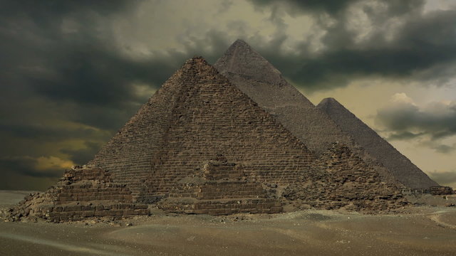 sunset clouds over great pyramids at Giza Cairo in Egypt, zoom in timelapse
