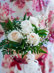 Flowers in the hands of a girl