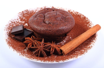 Baked muffins, star anise, cinnamon and chocolate