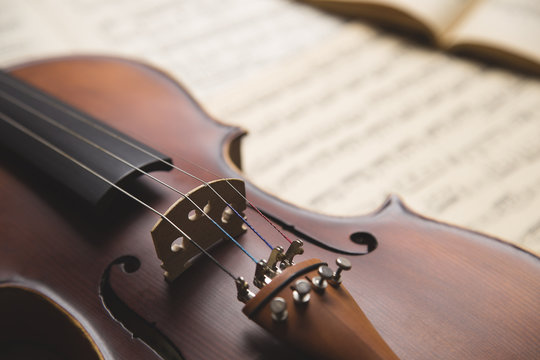 Vintage violin on the  sheet music.