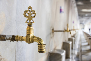 Tap in Blue Mosque for ritual ablution . Washing oneself is nessesery before Islam devotion.