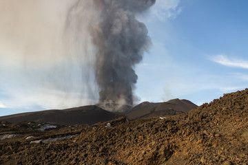 Volcano eruption. Mount Etna erupting from the crater Voragine

